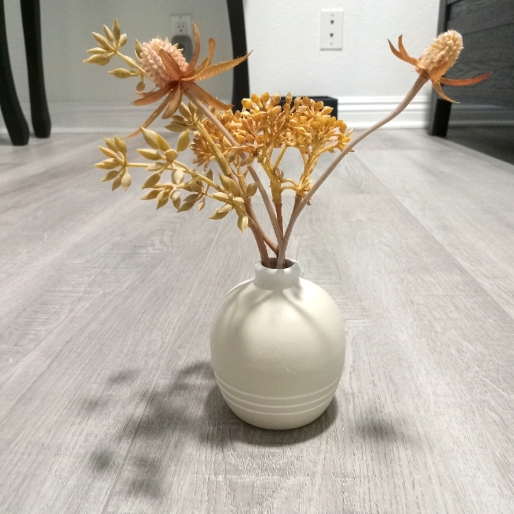 Elegant Cream Vase with Yellow and Orange Accents